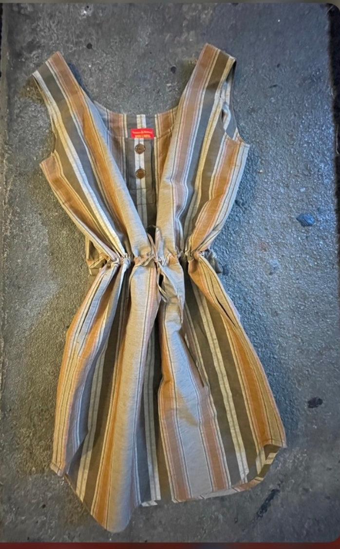 Vivienne Westwood Vintage squiggle clutch/ Cuff/ Anglomania t-shirt/ Red Label dress